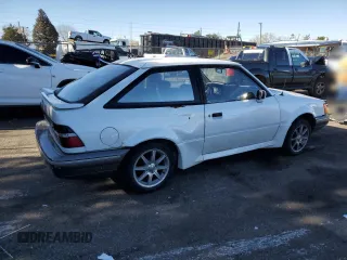 1989 Ford Escort z VIN 1FAPP9090KW279114, wystawiony jako Copart lot #83614994 z przebiegiem 60 585 mil mil oraz Nie do naprawy. Historia ofert i sprzedaży dostępna na DreamBid. Obrazek 3.