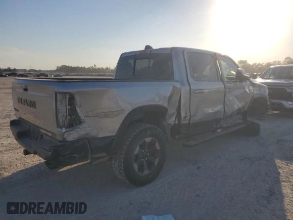 2020 Ram 1500 Rebel with VIN 1C6RRELT7LN299176, listed as a Copart auction lot 76778334 with 70,059 mi miles and Salvage title. Bid and sale history available at DreamBid. Image 3.