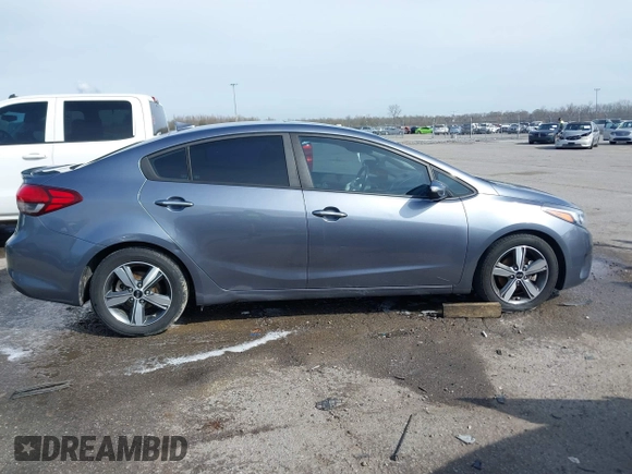 2018 Kia Forte LX with VIN 3KPFL4A79JE194864, listed as a IAAI auction lot 41657793 with 128,256 mi miles and . Bid and sale history available at DreamBid. Image 13.