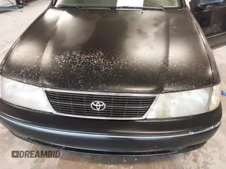 1998 Toyota Avalon XL with VIN 4T1BF18B7WU246141, listed as a IAAI auction lot 41405474 with 266,384 mi miles and . Bid and sale history available at DreamBid. Image 6.
