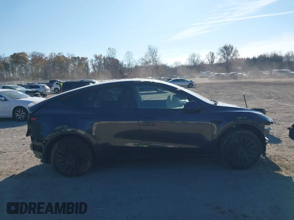 2024 Tesla Model Y with VIN 7SAYGDED3RF092501, listed as a IAAI auction lot 40820923 with 4,688 mi miles and . Bid and sale history available at DreamBid. Image 13.