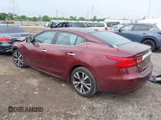 2016 Nissan Maxima SL with VIN 1N4AA6AP9GC401643, listed as a IAAI auction lot 42506704 with 103,197 mi miles and . Bid and sale history available at DreamBid. Image 3.