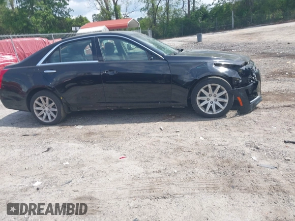 2016 Cadillac CTS RWD with VIN 1G6AP5SX0G0118831, listed as a IAAI auction lot 42105091 with 123,507 mi miles and . Bid and sale history available at DreamBid. Image 14.