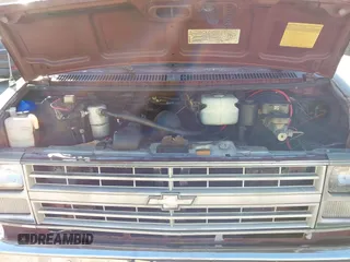 1986 Chevrolet Chevy Van z VIN 1GCEG25N9G7163670, wystawiony jako IAAI lot #41654650 z przebiegiem Nie podano mil oraz . Historia ofert i sprzedaży dostępna na DreamBid. Obrazek 10.