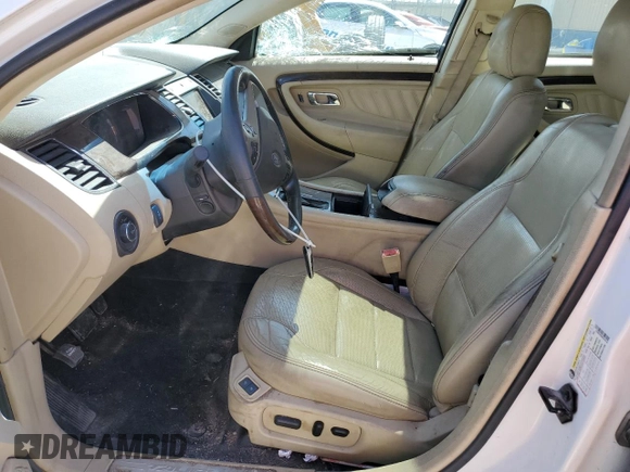 2013 Ford Taurus Limited with VIN 1FAHP2F8XDG154158, listed as a Copart auction lot 52065505 with 148,451 mi miles and Salvage Title. Bid and sale history available at DreamBid. Image 7.