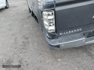 2014 Chevrolet Silverado 1500 LTZ with VIN 3GCUKSEC4EG384636, listed as a IAAI auction lot 41352484 with 153,976 mi miles. Bid and sale history available at carsss.com. Image 18.