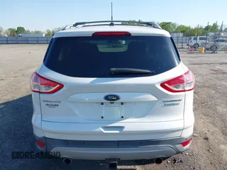 2013 Ford Escape Titanium with VIN 1FMCU0J97DUA70393, listed as a IAAI auction lot 41974106 with 73,548 mi miles and . Bid and sale history available at carsss.com. Image 16.