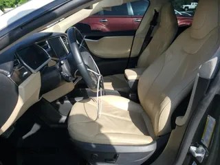 2013 Tesla Model S с VIN 5YJSA1CG2DFP25370, выставлен на аукционе Copart как лот 64003825 с пробегом 85 656 миль миль и Списание • Salvage title. История ставок и продаж доступна на DreamBid. Изображение 7.