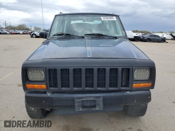 1998 Jeep Cherokee Sport with VIN 1J4FJ68S6WL188802, listed as a Copart auction lot 52094005 with 199,586 mi miles and Salvage Title. Bid and sale history available at carsss.com. Image 5.