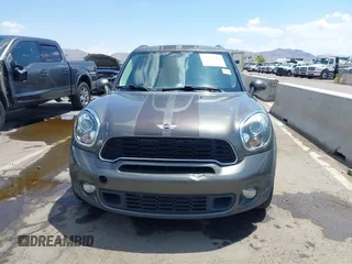 2014 MINI Countryman S with VIN WMWZC3C59EWP29137, listed as a IAAI auction lot 42661922 with 128,064 mi miles and . Bid and sale history available at DreamBid. Image 12.