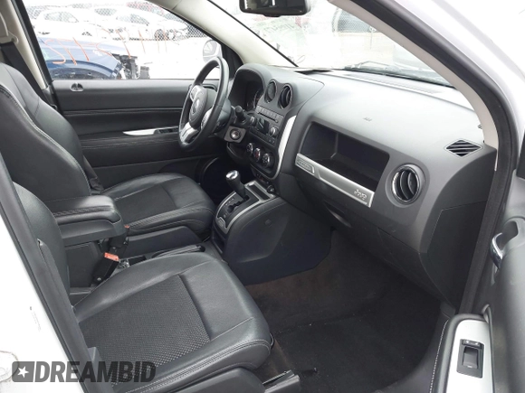 2015 Jeep Compass High Altitude Edition with VIN 1C4NJDEB6FD357687, listed as a IAAI auction lot 41995472 with 91,780 mi miles. Bid and sale history available at carsss.com. Image 5.