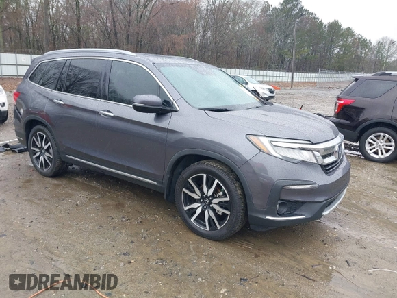 2021 Honda Pilot Touring 8-Passenger with VIN 5FNYF5H9XMB014190, listed as a IAAI auction lot 41749586 with 67,602 mi miles and . Bid and sale history available at DreamBid. Image 1.
