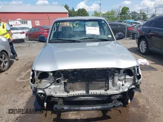 2003 Toyota Tacoma z VIN 5TENL42N63Z169165, wystawiony jako IAAI lot #42156261 z przebiegiem 106 813 mil mil oraz . Historia ofert i sprzedaży dostępna na DreamBid. Obrazek 12.