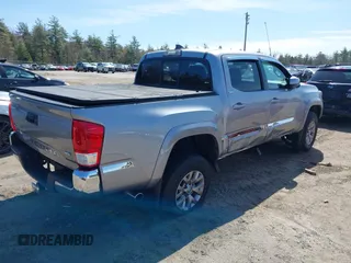 2017 Toyota Tacoma SR5 with VIN 3TMCZ5AN9HM117739, listed as a IAAI auction lot 42102292 with 54,739 mi miles and . Bid and sale history available at DreamBid. Image 4.