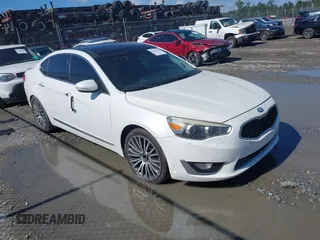 2014 Kia Cadenza Premium z VIN KNALN4D73E5121481, wystawiony jako IAAI lot #42243901 z przebiegiem 206 693 mil mil oraz . Historia ofert i sprzedaży dostępna na DreamBid. Obrazek 1.