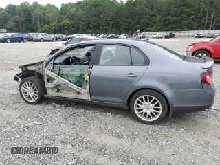 2008 Volkswagen Jetta Wolfsburg Edition with VIN 3VWRJ71K98M126974, listed as a Copart auction lot 58475155 with 115,038 mi miles and Salvage title. Bid and sale history available at DreamBid. Image 2.