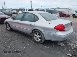 2003 Ford Taurus SES Standard with VIN 1FAFP55253A229632, listed as a IAAI auction lot 41867986 with 154,092 mi miles. Bid and sale history available at carsss.com. Image 3.