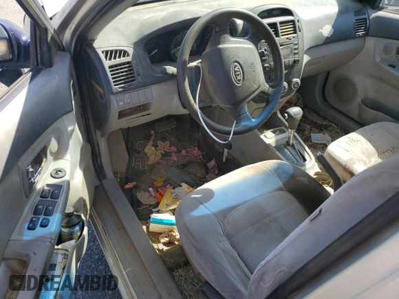 2008 Kia Spectra EX with VIN KNAFE122485540611, listed as a Copart auction lot 56258515 with 197,475 mi miles and Salvage title. Bid and sale history available at DreamBid. Image 8.