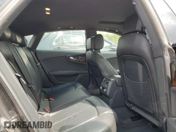 2015 Audi A7 3.0 TDI Premium Plus with VIN WAUWMAFC4FN002784, listed as a Copart auction lot 69375644 with 65,802 mi miles and Salvage Title. Bid and sale history available at carsss.com. Image 10.
