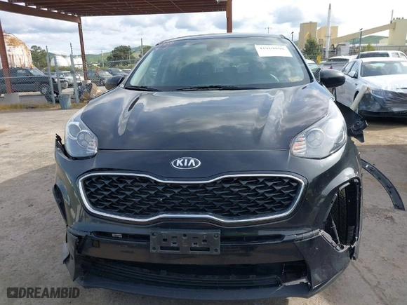 2020 Kia Sportage LX with VIN KNDPM3ACXL7701136, listed as a IAAI auction lot 41969998 with 89,102 mi miles. Bid and sale history available at carsss.com. Image 12.
