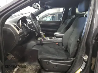 2016 Jeep Grand Cherokee Laredo with VIN 1C4RJFAG2GC317791, listed as a Copart auction lot 51296425 with 188,488 mi miles and Salvage title. Bid and sale history available at DreamBid. Image 7.