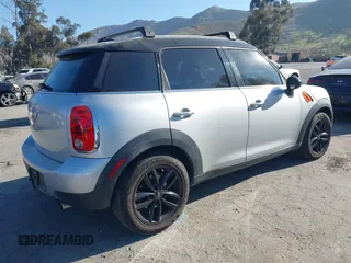2013 MINI Countryman with VIN WMWZB3C59DWM09740, listed as a IAAI auction lot 41648192 with 145,915 mi miles and . Bid and sale history available at DreamBid. Image 4.