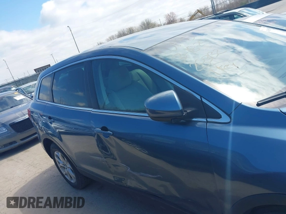 2015 Mazda CX-9 Sport with VIN JM3TB2BV7F0458193, listed as a IAAI auction lot 41886385 with 154,677 mi miles and . Bid and sale history available at carsss.com. Image 13.
