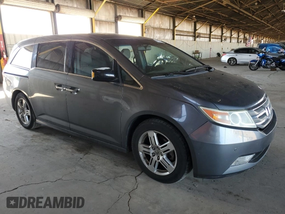 2012 Honda Odyssey Touring с VIN 5FNRL5H91CB138389, выставлен на аукционе Copart как лот 61137135 с пробегом 161 468 миль миль и Чистый • Clean title. История ставок и продаж доступна на DreamBid. Изображение 4.