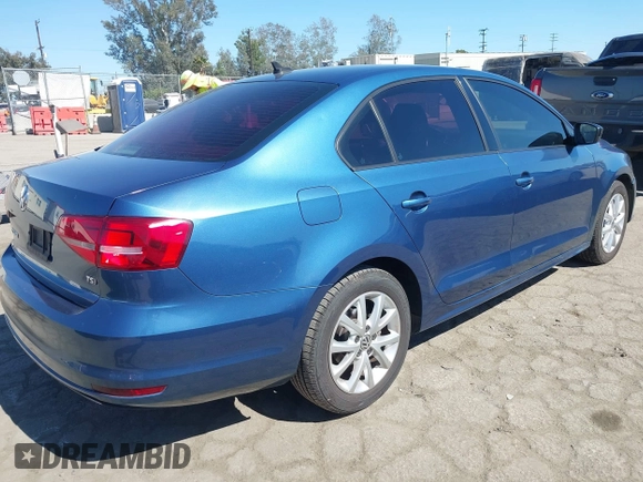 2015 Volkswagen Jetta SE with VIN 3VWD17AJXFM261556, listed as a IAAI auction lot 42227068 with 135,370 mi miles and . Bid and sale history available at DreamBid. Image 4.