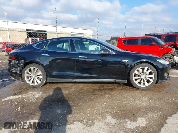2016 Tesla Model S 70 with VIN 5YJSA1E11GF124965, listed as a IAAI auction lot 41458132 with Not provided miles and . Bid and sale history available at DreamBid. Image 13.