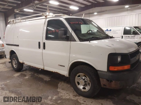 2004 Chevrolet Express Cargo Van with VIN 1GCGG25U641135906, listed as a IAAI auction lot 42038768 with 129,677 mi miles. Bid and sale history available at carsss.com. Image 1.