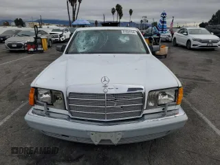 1989 Mercedes-Benz 560 with VIN WDBCA39E2KA479060, listed as a Copart auction lot 81924154 with 172,377 mi miles and Salvage Title. Bid and sale history available at DreamBid. Image 5.