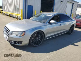2012 Audi A8 z VIN WAURVAFD7CN023286, wystawiony jako Copart lot #56594745 z przebiegiem 199 443 mil mil oraz Czysty tytuł • Clean title. Historia ofert i sprzedaży dostępna na DreamBid. Obrazek 1.