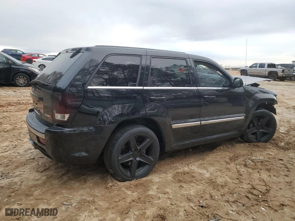 2007 Jeep Grand Cherokee SRT-8 with VIN 1J8HR78337C620584, listed as a Copart auction lot 85054184 with 0 mi miles and Salvage Title. Bid and sale history available at carsss.com. Image 3.