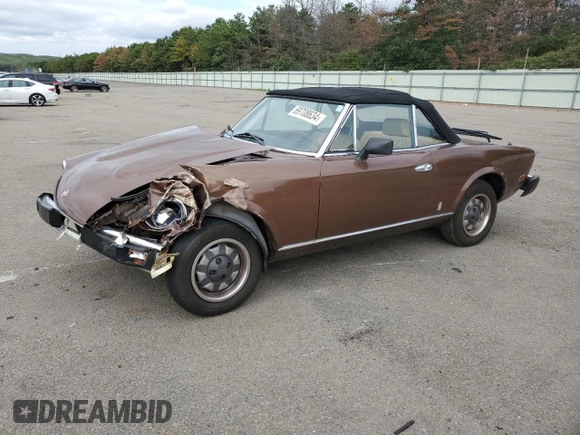 1980 FIAT 124 Spider z VIN 124CS20160764, wystawiony jako Copart lot #69708634 z przebiegiem 64 421 mil mil oraz Szkoda całkowita • Salvage title. Historia ofert i sprzedaży dostępna na DreamBid. Obrazek 1.