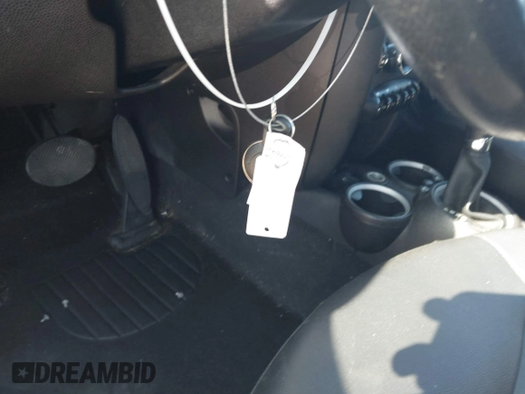 2013 MINI Convertible with VIN WMWZN3C58DT568824, listed as a IAAI auction lot 41998124 with 134,191 mi miles and . Bid and sale history available at DreamBid. Image 11.