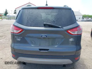 2016 Ford Escape SE with VIN 1FMCU9GX8GUB42944, listed as a IAAI auction lot 42171770 with 120,041 mi miles. Bid and sale history available at carsss.com. Image 16.