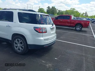 2013 GMC Acadia SLT with VIN 1GKKRSKD5DJ170594, listed as a IAAI auction lot 42031457 with 295,826 mi miles and . Bid and sale history available at DreamBid. Image 3.