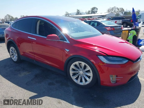 2016 Tesla Model X 70D with VIN 5YJXCAE23GF002262, listed as a IAAI auction lot 41839084 with 173,658 mi miles. Bid and sale history available at carsss.com. Image 1.