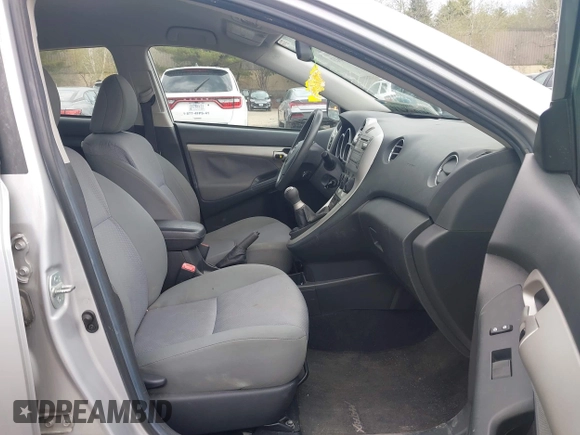 2009 Toyota Matrix with VIN 2T1KU40E99C006768, listed as a IAAI auction lot 42125813 with 163,832 mi miles. Bid and sale history available at carsss.com. Image 5.