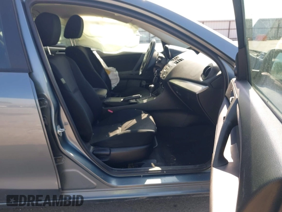 2012 Mazda 3 i Touring z VIN JM1BL1V73C1695634, wystawiony jako IAAI lot #42223477 z przebiegiem 138 302 mil mil oraz . Historia ofert i sprzedaży dostępna na DreamBid. Obrazek 5.