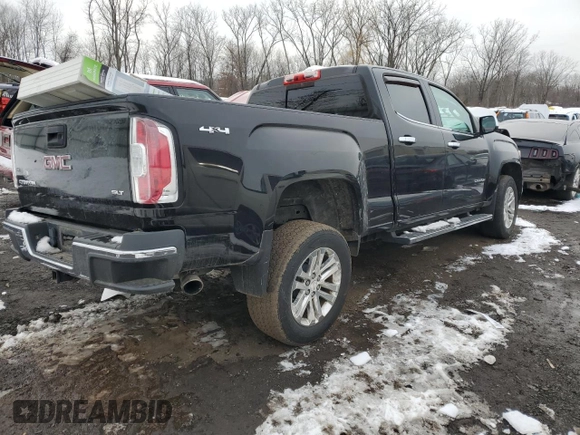 2015 GMC Canyon 4WD SLT with VIN 1GTG6CE35F1236096, listed as a Copart auction lot 44036465 with 55,829 mi miles and Salvage Title. Bid and sale history available at carsss.com. Image 3.