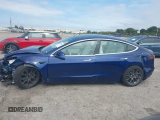 2020 Tesla Model 3 Standard Range Plus with VIN 5YJ3E1EA7LF785838, listed as a IAAI auction lot 41586081 with 38,392 mi miles and . Bid and sale history available at carsss.com. Image 14.