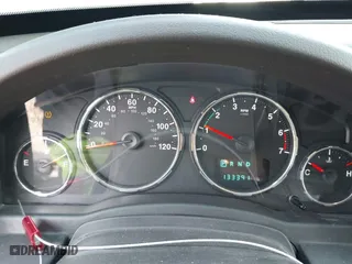 2011 Jeep Liberty Sport 70th Anniversary with VIN 1J4PN2GK4BW560391, listed as a IAAI auction lot 41918406 with 133,391 mi miles. Bid and sale history available at carsss.com. Image 7.