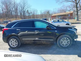 2018 Cadillac XT5 FWD with VIN 1GYKNARS5JZ235585, listed as a IAAI auction lot 41607440 with 77,220 mi miles and . Bid and sale history available at DreamBid. Image 13.
