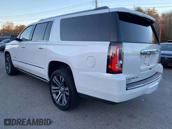 2020 GMC Yukon XL Denali with VIN 1GKS2HKJ6LR272614, listed as a Copart auction lot 48620095 with 107,217 mi miles and Clean Title. Bid and sale history available at carsss.com. Image 3.