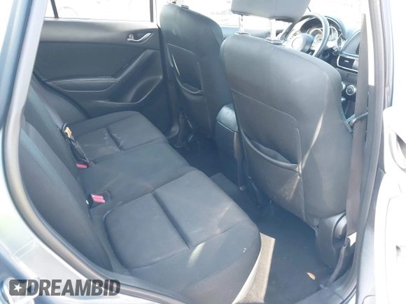 2016 Mazda CX-5 Sport with VIN JM3KE2BY8G0864983, listed as a IAAI auction lot 42072385 with 141,104 mi miles. Bid and sale history available at carsss.com. Image 8.