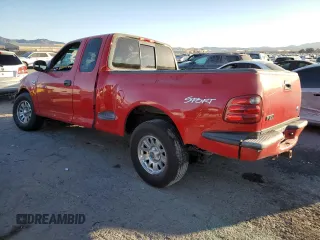 2002 Ford F-150 XL with VIN 1FTRX07W22KA41637, listed as a Copart auction lot 43665235 with 277,896 mi miles and Salvage title. Bid and sale history available at DreamBid. Image 2.
