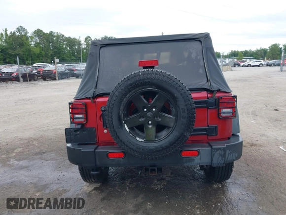 2012 Jeep Wrangler Sport with VIN 1C4AJWAG3CL197295, listed as a IAAI auction lot 42349118 with 117,381 mi miles and . Bid and sale history available at DreamBid. Image 16.