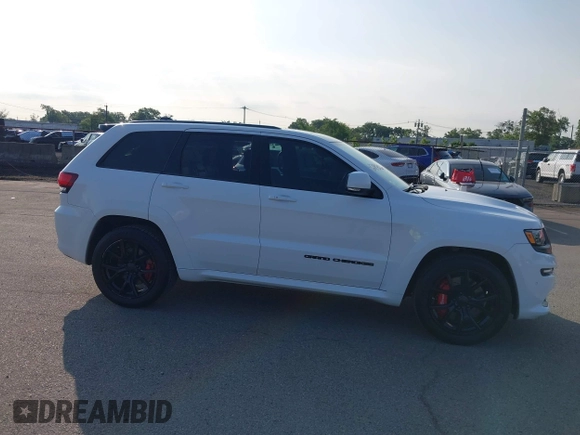 2016 Jeep Grand Cherokee SRT with VIN 1C4RJFDJ3GC503878, listed as a IAAI auction lot 42830257 with 82,661 mi miles and . Bid and sale history available at DreamBid. Image 6.
